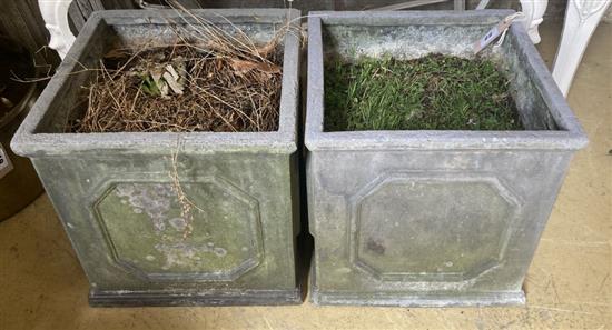 A pair of composition faux lead square garden planters, height 32cm